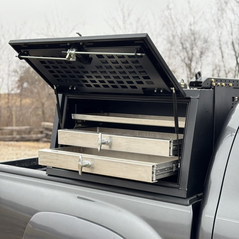 Truck bed rail toolboxes with shelves