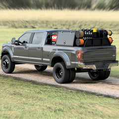 Rear three quarter view of the universal welding skid in a Ford long bed